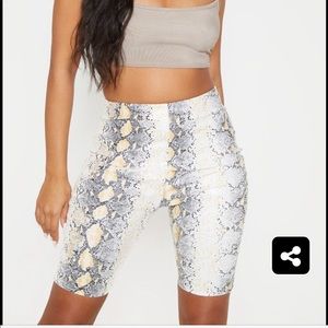 PLT white faux leather snake print biker short